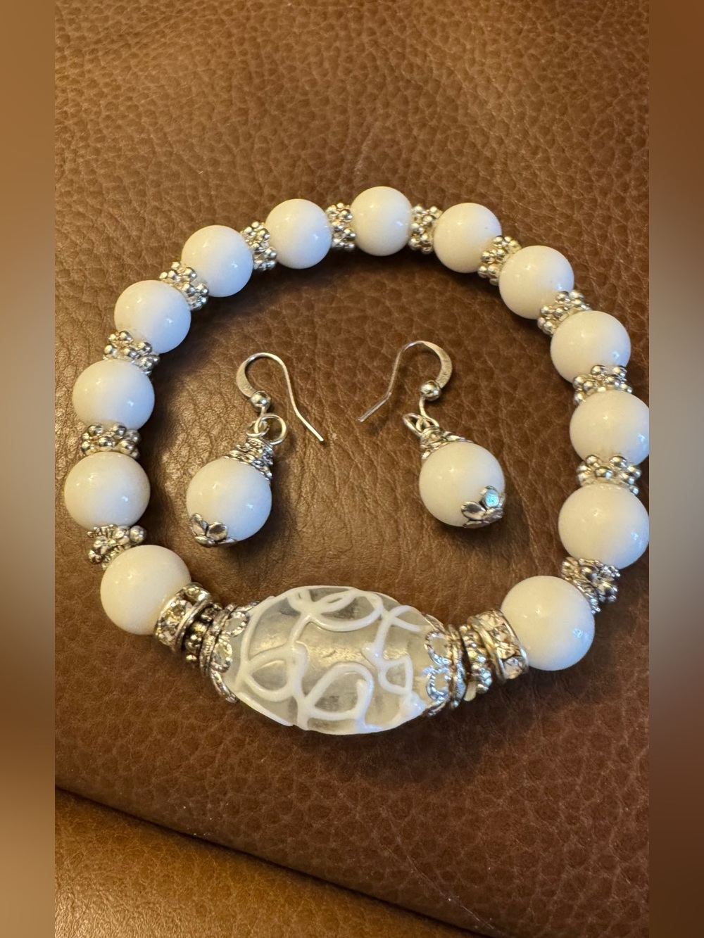 white glass beaded bracelet w/unique focal bead & silver spacers w/earrings